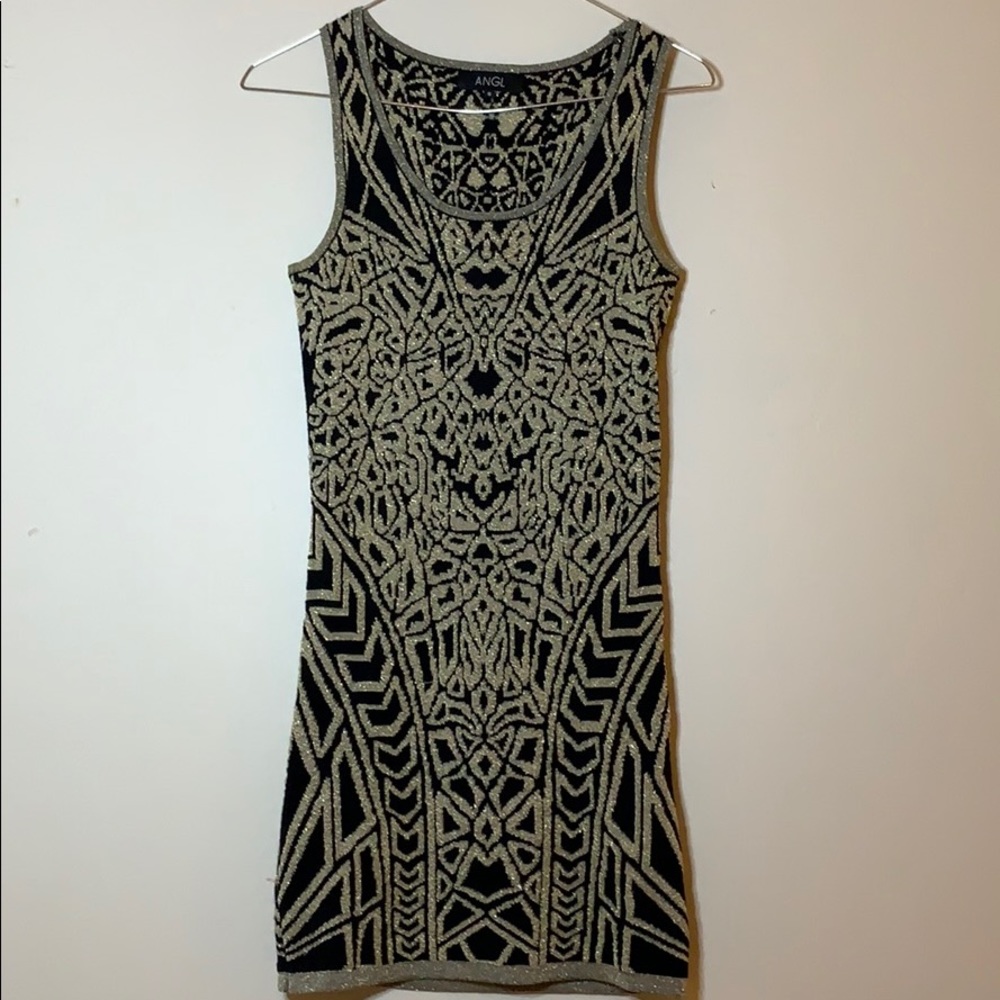 Black and gold patterned bodycon dress.